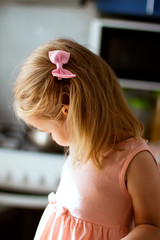 little girl with a bow in her hair