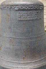 bell in front of the church in Bielefeld, Stiftskirche Schildesche ist eine evangelisch-lutherische Gemeindekirche im Bielefeld