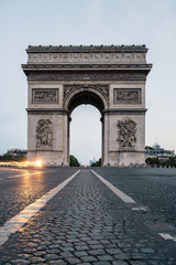 Arc de Triomphe (Arch of Triumph) from Avenue des Champs-Elysees, Paris, France.