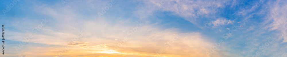 Wall mural panorama of dramatic vibrant color with beautiful cloud of sunrise and sunset. panoramic image.