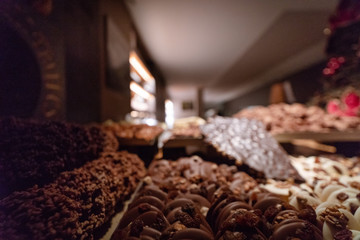 Bruges candy shop and variety of chocolates. blur view