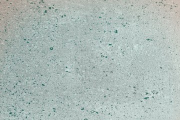 teal, sea-green grainy messy paint on the table texture - wonderful abstract photo background