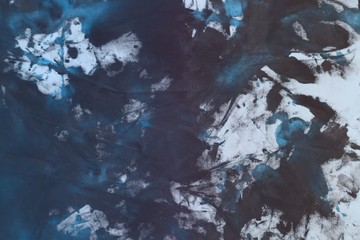 pretty vintage light blue randomly painted canvas, fabric with color paint spots and blots texture for use as background.