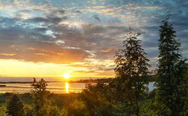 Beautiful sunset over the river. Relaxation and meditation concept.