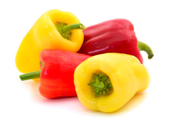 Yellow, red and orange peppers isolated.