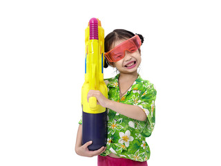 Young Asian girl with water gun on white background, Songkran Festival concept.