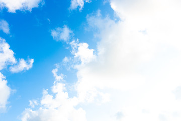 Nature Bright blue Sky with white clouds on blackground. Beautiful sky and clouds in the afternoon.