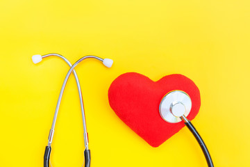 Simply minimal design with medicine equipment stethoscope or phonendoscope and red heart isolated...