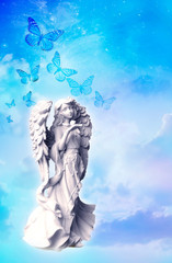 angel archangel with a dove and butterflies over blue background 