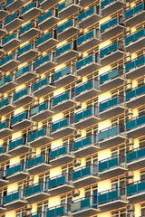  repeating building elements, blue balconies