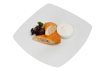 Homemade pancakes with meat on a white plate on white isolated background