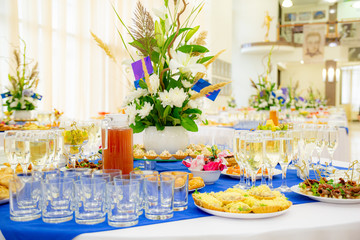 Festively laid tables at the Banquet. Various delicacies, snacks and drinks. Catering.