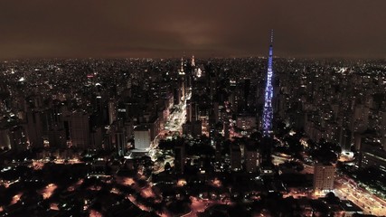 Night view of famous public places of Sao Paulo, Brazil. Fantastic landscape. Region of Pacaembu Avenue and Charles Miller Square.