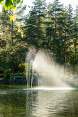 A park in the city center with a pond and a fountain, Kouvola, Finland