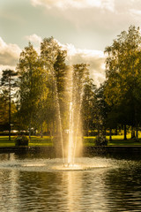 A park in the city center with a pond and a fountain, Kouvola, Finland