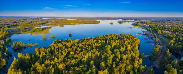 Obraz premium Panorama of Karelia on a Sunny day. View of Karelia from a height. nature of Russia. Leningrad region. Vuoksa River. lake Ladoga. Islands in lake Ladoga. Summer trip to Russia.