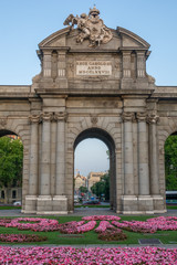 Fototapeta na wymiar The Alcala Door (Puerta de Alcala) is a gate in the center of Madrid, Spain. It is the landmark of the city.