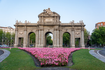 Obraz premium The Alcala Door (Puerta de Alcala) is a gate in the center of Madrid, Spain. It is the landmark of the city.
