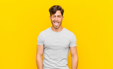  with cheerful, carefree, rebellious attitude, joking and sticking tongue out, having fun