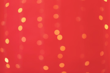 Abstract blurred shiny bokeh lights red background