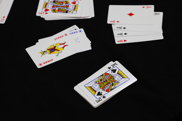 Playing Card with black background, Poker. Blackjack.