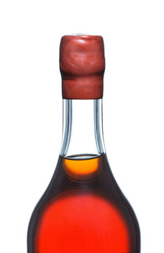 close-up bottle of strong alcohol, Armagnac, brandy, cognac isolated on a white background