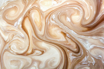 abstract background mixing coffee with milk