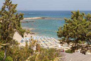 Scenic view at the coastline of Kiotari on Rhodes island, Greece with gravel beach