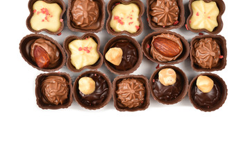 Mix of tasty chocolate candy collection isolated on white. Copy space.