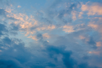 Colorful sky with clouds at sunset background. Cloudscape.