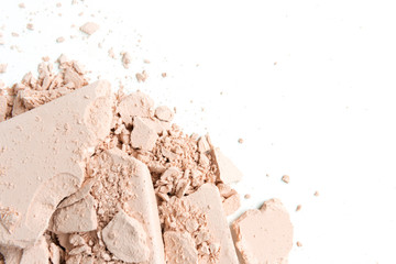 Cracked of face powder on white background with copy space, Macro, top view