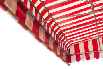 red and white striped awning isolate on white background. shading canvas with steel structure of shop. exterior decoration.