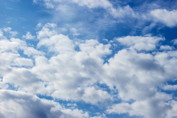 Fototapeta premium Blue sky with white clouds closeup.