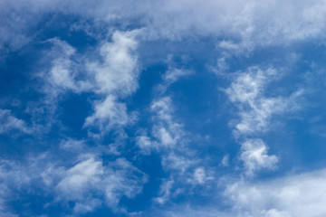 Fototapeta premium Blue sky with white clouds closeup.