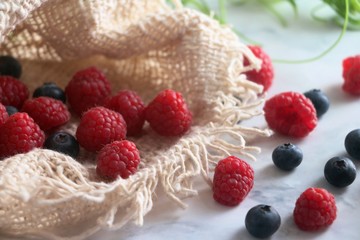 Fresh Raspberries and Blueberries in a sack