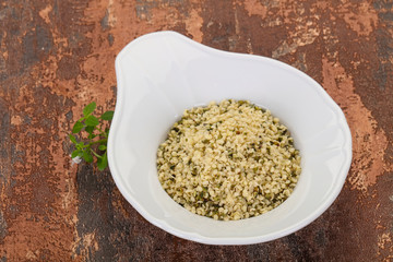 Peeled hemp seeds in the bowl