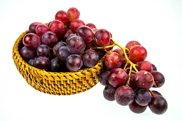 Obraz premium Red grapes on white background