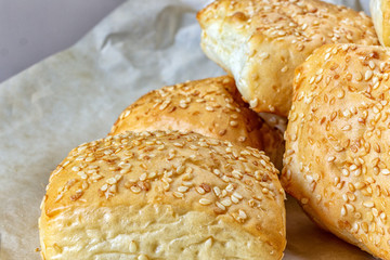 Sesame seeds on a golden crust of Milanese buns