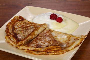 Pancakes with sour cream and condenced milk