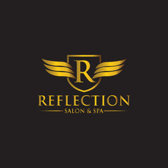 R letter luxury gold color logo