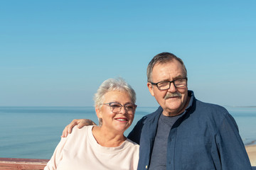 Happy seniors couple on the seaside