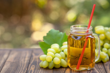 grape juice in glass mason jar