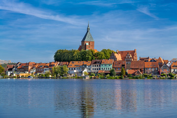 Naklejka premium Moelln (German: Mölln), Germany. The old town, view across the City Lake.
