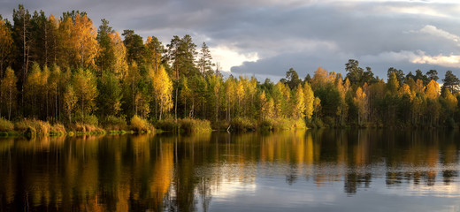 panorama of autumn landscape with forest lake, Russia, Ural