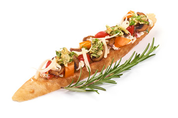 Italian Bruschetta with cottage cheese, grated cheese, tomatoes, champignon mushrooms and garlic. Spanish Tapas and Pinchos, isolated on white background