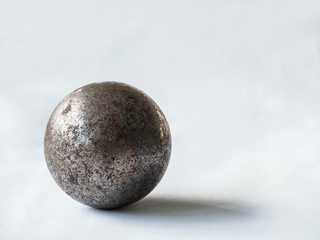 rust metal steel sphere on white background