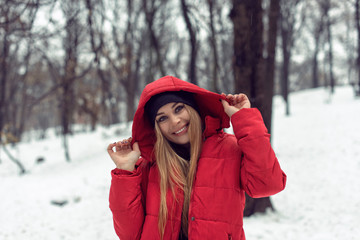 December walk with a young pretty blonde