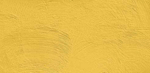 Abstract Grunge Decorative Yellow Stucco Wall Background