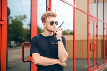 Handsome male security guard outdoors