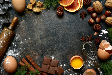 Obraz na płótnie Canvas Christmas culinary background with ingredients and props for baking. Top view with copy space.